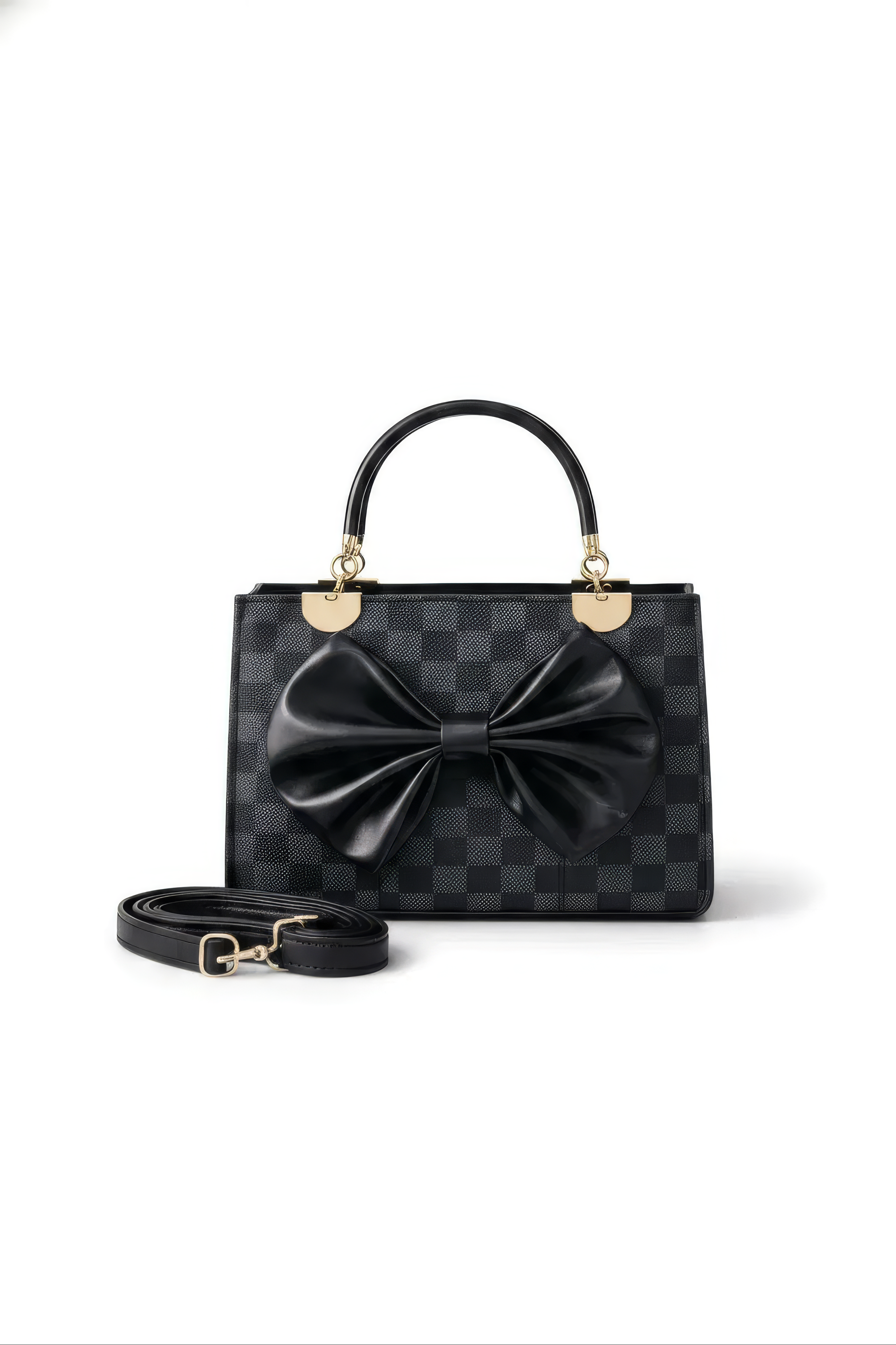The Nocturne Bow Handbag is a black leather bag with a checkered pattern, gold hardware, and a large black bow on the front. It includes a matching detachable shoulder strap, displayed in front of its structured top handle against a white background.