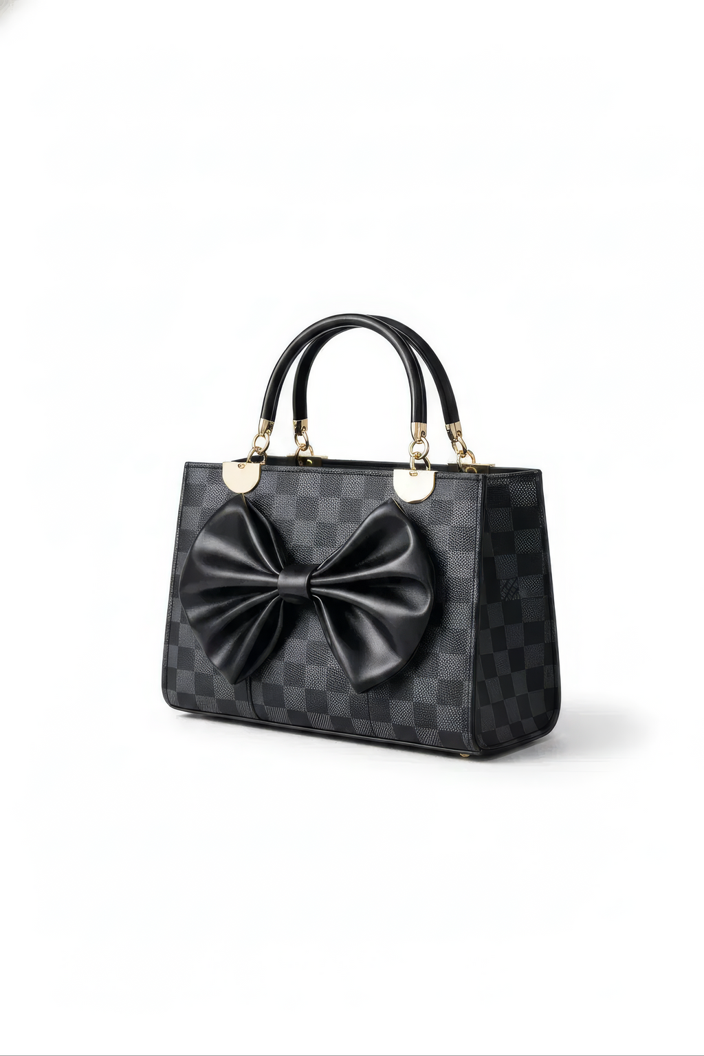 The Nocturne Bow Handbag is a black leather bag featuring a checkered design, gold hardware, two top handles, and a large black leather bow on the front, all showcased against a plain white background.